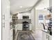 Bright, modern kitchen with white cabinets, stainless steel appliances, and stylish decor at 1205 Wisconsin Ave, St Cloud, FL 34769