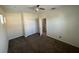 Bedroom with a ceiling fan, neutral walls, and carpeted flooring at 14320 Desert Haven St # 3906, Windermere, FL 34786