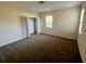 Bedroom with a closet, a window, and carpeted flooring at 14320 Desert Haven St # 3906, Windermere, FL 34786