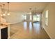 Spacious living room featuring tile floors, natural light, and an open layout for modern living at 14320 Desert Haven St # 3906, Windermere, FL 34786