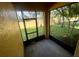 Enclosed screened patio with views of a well-maintained yard at 14320 Desert Haven St # 3906, Windermere, FL 34786
