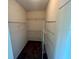 Walk-in closet featuring wire shelving and carpeted floor at 14320 Desert Haven St # 3906, Windermere, FL 34786