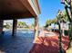 Inviting community pool area with ample seating, palm trees, and a relaxing atmosphere at 1509 Portofino Meadows Blvd, Orlando, FL 32824