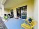 Relaxing covered patio with comfortable seating, perfect for outdoor enjoyment at 1509 Portofino Meadows Blvd, Orlando, FL 32824