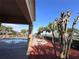 Community pool with poolside seating overlooking the lake at 1509 Portofino Meadows Blvd, Orlando, FL 32824