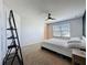 Bright bedroom featuring neutral walls, ceiling fan, and a comfortable bed at 1510 Chelsea Dr, Davenport, FL 33897
