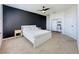 Bright bedroom featuring neutral walls, ceiling fan, and a comfortable bed at 1510 Chelsea Dr, Davenport, FL 33897