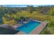 Take a dip in the community pool, complete with a charming pavilion and sun loungers, perfect for residents at 153 Cambridge Ave, Davenport, FL 33896