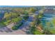 Experience a grand entrance to the community with manicured landscaping and a welcoming brick-paved road at 153 Cambridge Ave, Davenport, FL 33896