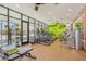 Bright fitness center with a variety of equipment, including treadmills and weight machines at 16694 Olive Hill Dr, Winter Garden, FL 34787