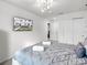 This bedroom features a TV, closet, and ensuite bathroom access at 1800 Tropical Palms Cir, Kissimmee, FL 34747