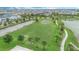 Large community field with sport court for residents to enjoy outdoor activities and sports at 1800 Tropical Palms Cir, Kissimmee, FL 34747