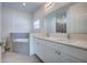Elegant bathroom with double vanity, granite countertops, separate bathtub, and shower at 2033 10Th Ave, Deland, FL 32724