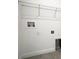 The laundry room has the hookups and wire rack shelving at 2033 10Th Ave, Deland, FL 32724