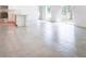 Bright, open concept living area with tile flooring and sliding glass doors to the backyard at 2033 10Th Ave, Deland, FL 32724