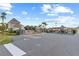 Community park with a playground, parking area, and well-maintained green spaces for Gathering enjoyment at 2250 Windcrest Lake Cir, Orlando, FL 32824