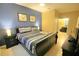 Relaxing bedroom featuring an ensuite bathroom and ample closet space at 2305 Silver Palm Dr # 102, Kissimmee, FL 34747