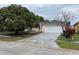 Charming single Gathering home with a large front yard and a two car garage at 2417 Lancashire Ln, Kissimmee, FL 34743