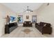 Inviting living room with tile floors, neutral walls, and ample natural light at 243 Competition Dr, Kissimmee, FL 34743