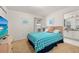 Comfortable bedroom featuring a queen bed, carpeted floors, and a TV at 248 Breezy Oaks Ct, Davenport, FL 33896