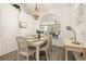 Open dining room area with views to the outside at 248 Breezy Oaks Ct, Davenport, FL 33896