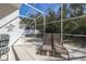 Relaxing pool deck with seating and view of the pool at 248 Breezy Oaks Ct, Davenport, FL 33896