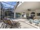 Spacious pool deck with comfortable seating and a view of the pool at 248 Breezy Oaks Ct, Davenport, FL 33896