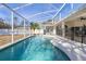 Inviting screened-in pool with clear blue water, perfect for relaxation and outdoor entertaining at 248 Breezy Oaks Ct, Davenport, FL 33896