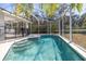Sparkling screened pool and deck perfect for relaxation and outdoor entertainment at 248 Breezy Oaks Ct, Davenport, FL 33896