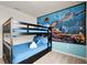 Whimsical bedroom with bunk beds and Finding Nemo mural at 281 Jetty Way, Davenport, FL 33897