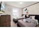 Charming ' bedroom with playful decor, two twin beds, and cartoon decorations at 281 Jetty Way, Davenport, FL 33897
