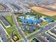 Aerial view highlighting the neighborhood with a pool, clubhouse, and basketball court at 281 Jetty Way, Davenport, FL 33897