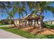 Beautiful single-story home with a two-car garage, manicured lawn, and a charming front porch at 2864 Lafayette Trace Dr, St Cloud, FL 34772
