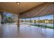 Relaxing screened-in patio with a lovely lake view and comfortable seating, perfect for outdoor living and entertaining at 2864 Lafayette Trace Dr, St Cloud, FL 34772
