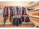 Spacious walk-in closet with shelves, and hanging racks for maximum storage solutions and organization at 2864 Lafayette Trace Dr, St Cloud, FL 34772