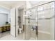 Modern bathroom featuring tiled walk-in shower and adjacent toilet room for added privacy at 309 Vestrella Dr, Poinciana, FL 34759