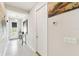 Inviting foyer and hallway featuring tile flooring and neutral wall colors at 309 Vestrella Dr, Poinciana, FL 34759