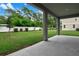 View of backyard from back porch and includes a grass yard and privacy fence at 3741 Deer Ridge Dr, Mount Dora, FL 32757