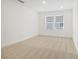 Bright bedroom with neutral carpet, recessed lighting, and a window at 3741 Deer Ridge Dr, Mount Dora, FL 32757