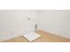 An unfinished laundry room with tile floors and hookups for washer and dryer at 3741 Deer Ridge Dr, Mount Dora, FL 32757