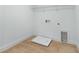 Functional laundry room with tile flooring and convenient hookups at 3749 Deer Ridge Dr, Mount Dora, FL 32757