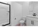 Modern bathroom featuring a glass-enclosed shower and a vanity with contemporary fixtures at 3757 Deer Ridge Dr, Mount Dora, FL 32757