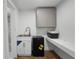 Features a mini-fridge, sink, and microwave, offering basic amenities for simple meal preparation at 4217 Park Lake St, Orlando, FL 32803