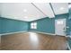 Bright living room with hardwood floors, neutral paint, large windows for natural light, and a welcoming atmosphere at 4217 Park Lake St, Orlando, FL 32803