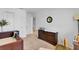 Bedroom with changing table, dresser, and closet at 4544 Teoli Ct, Kissimmee, FL 34746