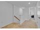 Spacious hallway with carpet and a staircase leading to the second floor at 4544 Teoli Ct, Kissimmee, FL 34746