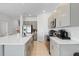 Modern kitchen featuring stainless steel appliances and ample countertop space at 4544 Teoli Ct, Kissimmee, FL 34746