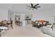 Open floor plan with the kitchen, dining, and living room at 4544 Teoli Ct, Kissimmee, FL 34746
