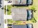 A high definition aerial view of a property with a backyard pool and well maintained landscaping at 509 Cadiz Loop, Davenport, FL 33837