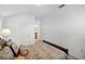 Neutral bedroom featuring comfortable bedding, and ensuite bathroom at 509 Cadiz Loop, Davenport, FL 33837